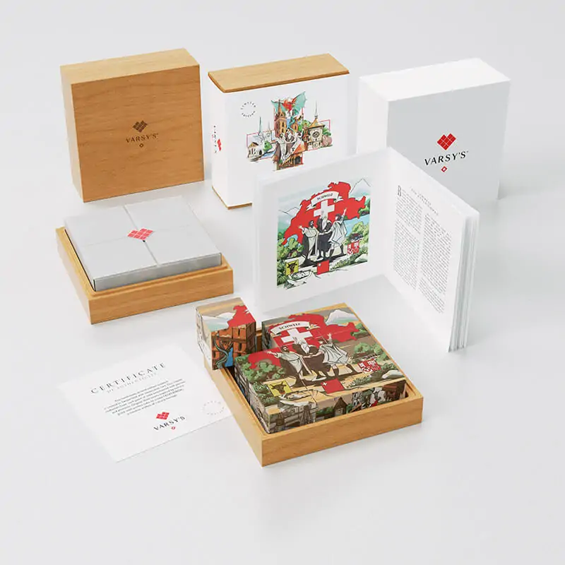 [:en]A booklet with 6 legends of Switzerland, like the story of the Oath on the Rütli, 9 beechwood cubes in a massive wooden box - VARSY’S Legendbox Set 1 is the perfect souvenir from Switzerland.[:de]Ein Büchlein mit 6 Legenden aus der Schweiz, wie der Geschichte vom Rütlischwur, 9 Holzwürfel in einer massiven Holzbox - VARSY’S Legendenbox Set 1 ist das perfekte Geschenk Schweiz.[:]